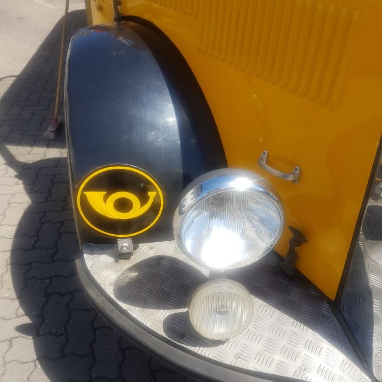 Oldtimerbus Postschild